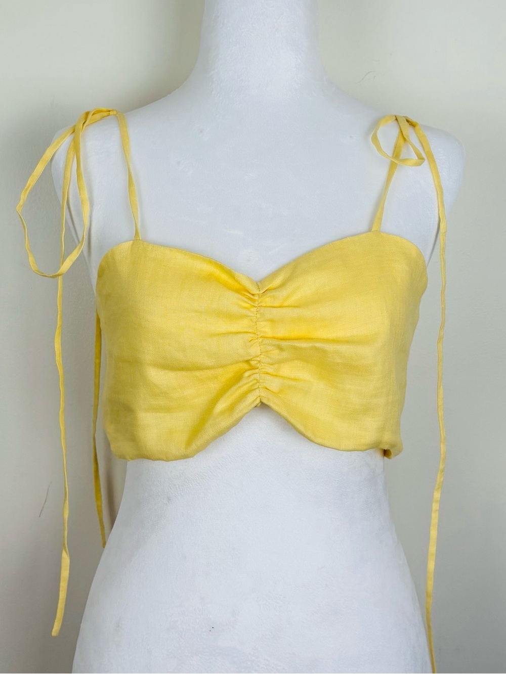 Miguelina buttery yellow tie strap ruched crop top. M